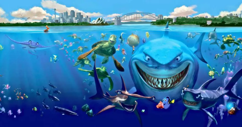 An animated underwater scene with various sea creatures, including a large smiling shark, in front of a cityscape